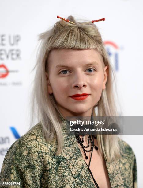 Singer Aurora arrives at the Universal Music Group's 2017 GRAMMY After Party at The Theatre at Ace Hotel on February 12, 2017 in Los Angeles,...