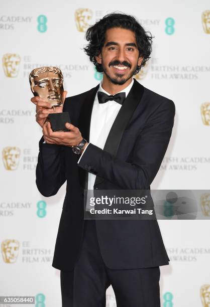 Dev Patel, winner of the Supporting Actor award, poses in the winners room at the 70th EE British Academy Film Awards at the Royal Albert Hall on...