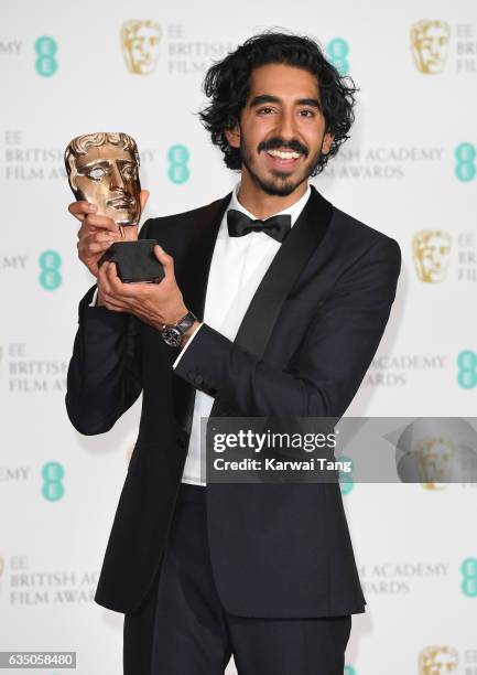Dev Patel, winner of the Supporting Actor award, poses in the winners room at the 70th EE British Academy Film Awards at the Royal Albert Hall on...