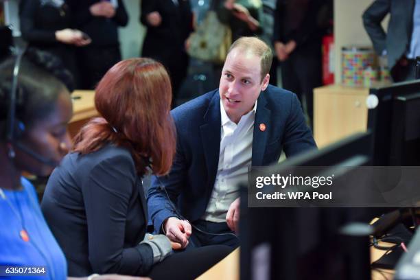 Prince Willaim, Duke of Cambridge speaks with Councillor Carys Lewis as he officially launched the Centrepoint Helpline in London on February 13,...