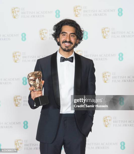 Dev Patel, winner of the Supporting Actor award, poses in the winners room at the 70th EE British Academy Film Awards at Royal Albert Hall on...