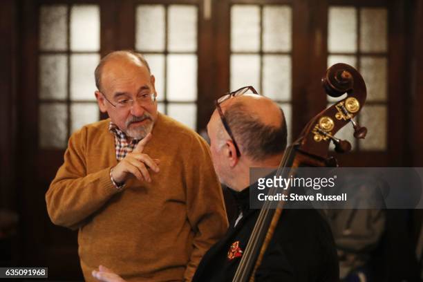 Roberto Occhipinti on the contrabass discusses the score with Italian composer Salvatore Sciarrino who is in Toronto to perform a number of concerts....