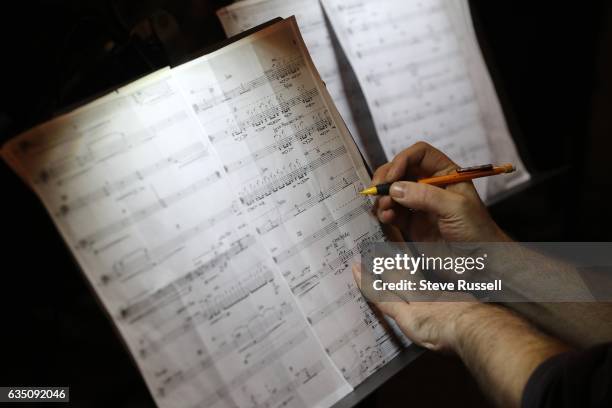 Member of the ensemble makes a note on the score. Italian composer Salvatore Sciarrino is in Toronto to perform a number of concerts. Here is his...