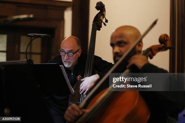 Roberto Occhipinti looks towards the director as he plays the Contrabass. Italian composer Salvatore Sciarrino is in Toronto to perform a number of...
