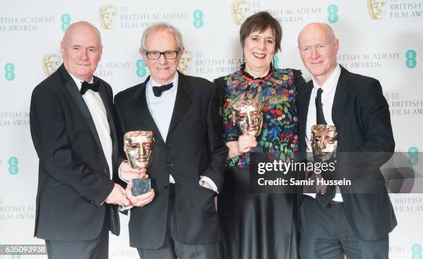 Dave Johns, Ken Loach, Rebecca O'Brien and Paul Laverty pose with their awards for Outstanding British Film award for 'I, Daniel Blake' pose in the...