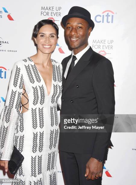 Singer-songwriter Aloe Blacc and rapper Maya Jupiter arrive at the Universal Music Group's 2017 GRAMMY After Party at The Theatre at Ace Hotel on...