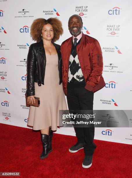 Actors Bridgid Coulter and Don Cheadle arrive at the Universal Music Group's 2017 GRAMMY After Party at The Theatre at Ace Hotel on February 12, 2017...