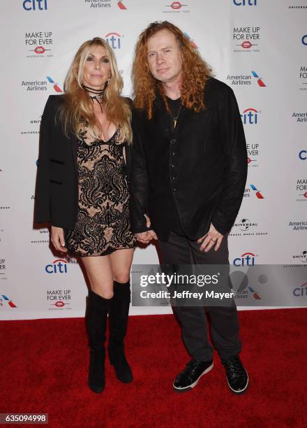 Pamela Anne Casselberry and musician Dave Mustaine arrive at the Universal Music Group's 2017 GRAMMY After Party at The Theatre at Ace Hotel on...