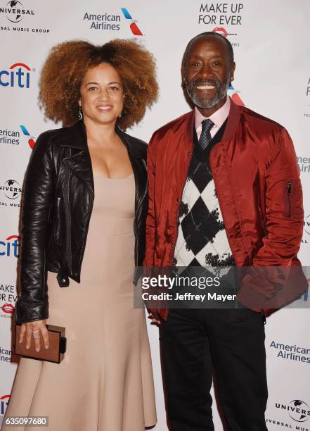 Actors Bridgid Coulter and Don Cheadle arrive at the Universal Music Group's 2017 GRAMMY After Party at The Theatre at Ace Hotel on February 12, 2017...