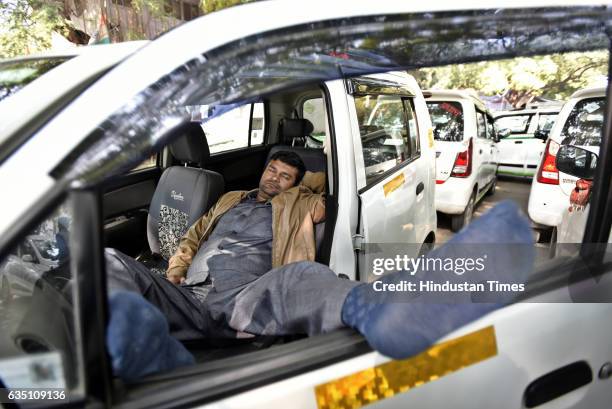 Ola and Uber taxi drivers on the fourth day strike against withdrawal of driver incentives, and other demands at Jantar Mantar on February 13, 2017...