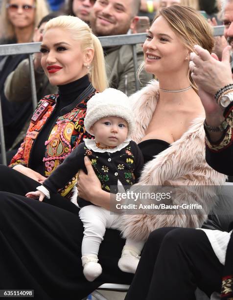 Model Behati Prinsloo, daughter Dusty Rose Levine and singer Gwen Stefani attend the ceremony honoring Adam Levine with star on the Hollywood Walk of...