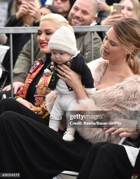 Model Behati Prinsloo, daughter Dusty Rose Levine and singer Gwen Stefani attend the ceremony honoring Adam Levine with star on the Hollywood Walk of...