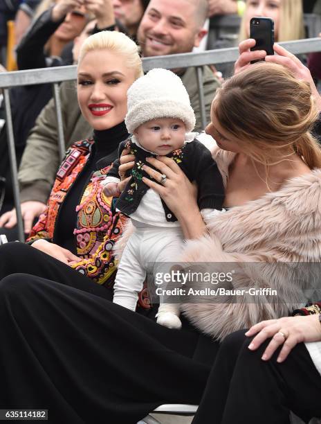 Model Behati Prinsloo, daughter Dusty Rose Levine and singer Gwen Stefani attend the ceremony honoring Adam Levine with star on the Hollywood Walk of...