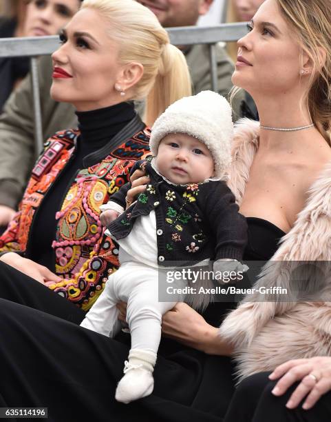 Model Behati Prinsloo, daughter Dusty Rose Levine and singer Gwen Stefani attend the ceremony honoring Adam Levine with star on the Hollywood Walk of...