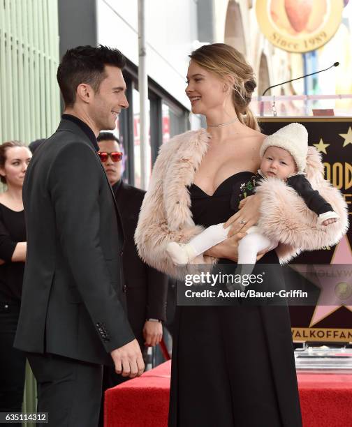 Recording artist Adam Levine, model Behati Prinsloo and daughter Dusty Rose Levine attend the ceremony honoring Adam Levine with star on the...