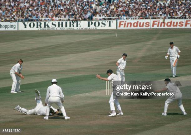 England batsman Geoff Boycott, on 22 out of his score of 191, looks back to see Australian wicketkeeper Rod Marsh drop a chance off the bowling of...