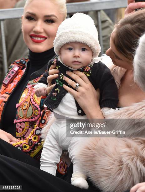 Model Behati Prinsloo, daughter Dusty Rose Levine and singer Gwen Stefani attend the ceremony honoring Adam Levine with star on the Hollywood Walk of...