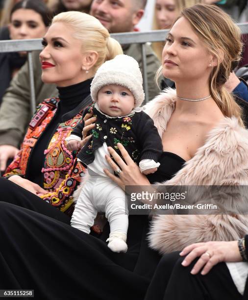 Model Behati Prinsloo, daughter Dusty Rose Levine and singer Gwen Stefani attend the ceremony honoring Adam Levine with star on the Hollywood Walk of...