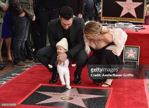 Recording artist Adam Levine, model Behati Prinsloo and daughter Dusty Rose Levine attend the ceremony honoring Adam Levine with star on the...