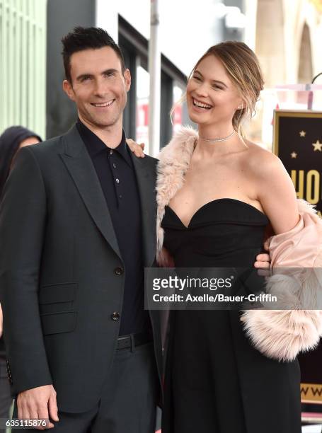 Recording artist Adam Levine and wife model Behati Prinsloo attend the ceremony honoring Adam Levine with star on the Hollywood Walk of Fame on...