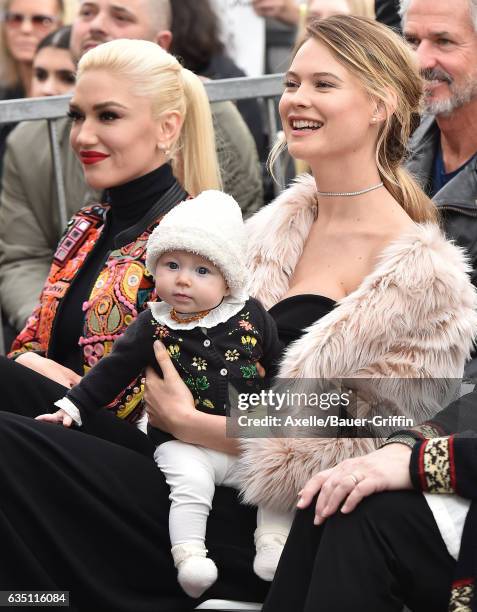 Model Behati Prinsloo, daughter Dusty Rose Levine and singer Gwen Stefani attend the ceremony honoring Adam Levine with star on the Hollywood Walk of...