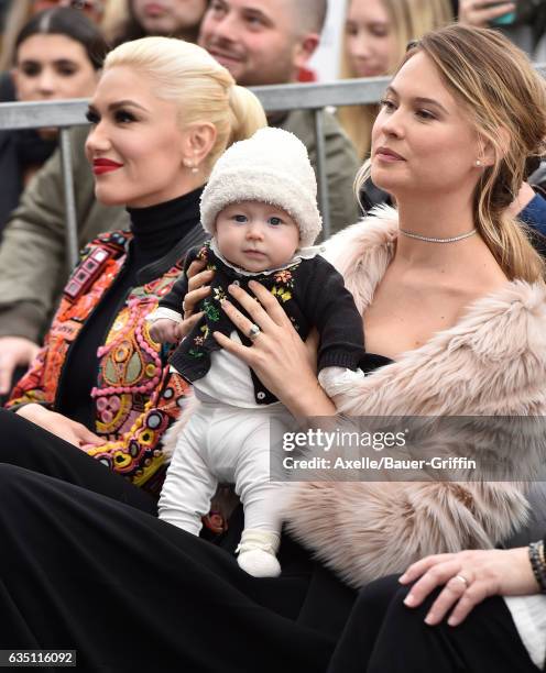 Model Behati Prinsloo, daughter Dusty Rose Levine and singer Gwen Stefani attend the ceremony honoring Adam Levine with star on the Hollywood Walk of...