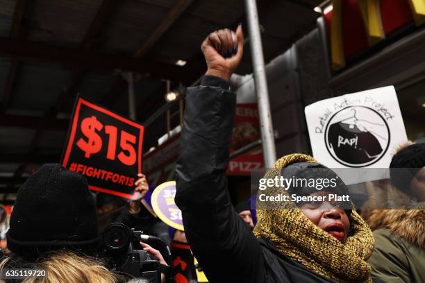 Protesters with NYC Fight for $15 gather in front of a McDonalds to rally against fast food executive Andrew Puzder, who is President Donald Trump's...