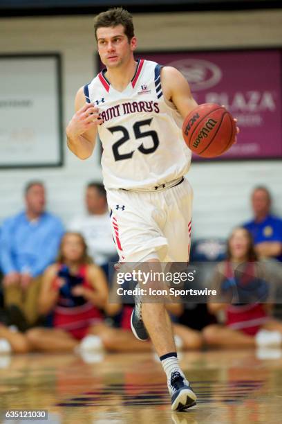 St. Mary's Gaels guard Joe Rahon dribbles the ball up court during the second half of the Gaels' 74-64 loss to the top-ranked Gonzaga Bulldogs on...