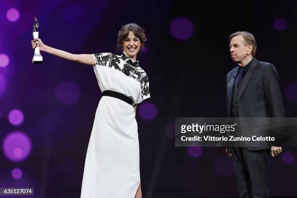 Shooting Star Victoria Guerra receives the award from actor Timothy Spall at the 'The Party' premiere during the 67th Berlinale International Film...