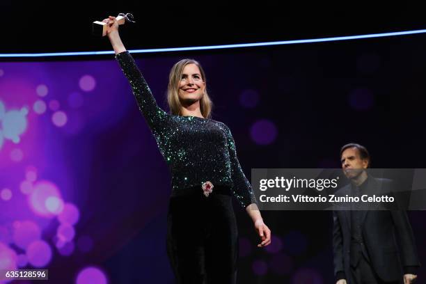 Shooting Star Hannah Hoekstra receives the award from actor Timothy Spall at the 'The Party' premiere during the 67th Berlinale International Film...