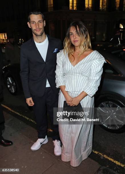 Simon Jacquemus and guest arrive in an Audi at the ELLE Style Awards at 41 Conduit Street on February 13, 2017 in London, England.