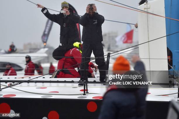 French skipper Eric Bellion celebrates aboard his Imoca 60 "Comme un seul Homme" as he arrives at Les Sables d'Olonne after placing 9th of the Vendee...