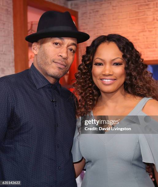 Actor James Lesure and actress/host Garcelle Beauvais pose at Hollywood Today Live at W Hollywood on February 13, 2017 in Hollywood, California.