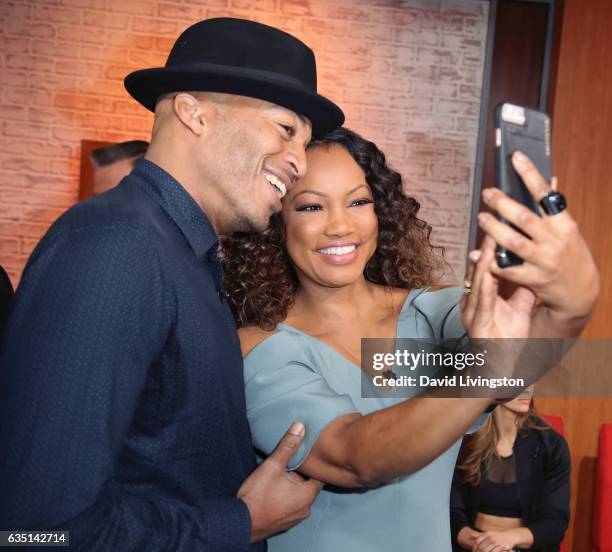 Actor James Lesure and actress/host Garcelle Beauvais pose for a selfie at Hollywood Today Live at W Hollywood on February 13, 2017 in Hollywood,...