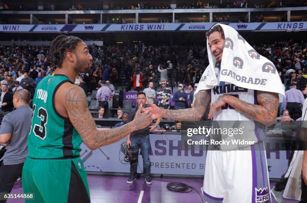 James Young of the Boston Celtics greets Willie Cauley-Stein of the Sacramento Kings after the game on February 8, 2017 at Golden 1 Center in...