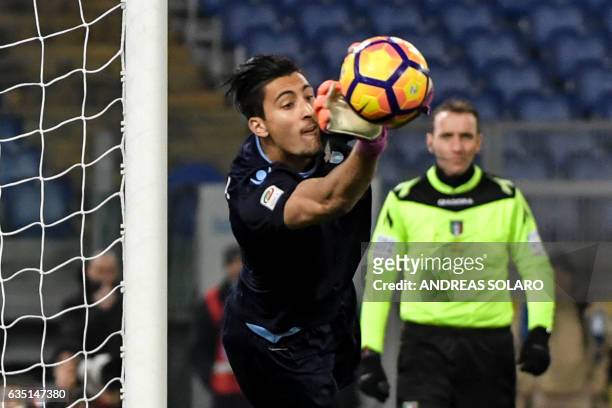 Lazio's goalkeeper from Albania Thomas Strakosha deflects the ball during the Italian Serie A football match Lazio vs Milan on February 13 at Rome's...
