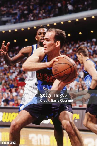 Danny Ferry of the Cleveland Cavaliers looks to pass against the Orlando Magic on December 7, 1994 at the Orlando Arena in Orlando, Florida. NOTE TO...