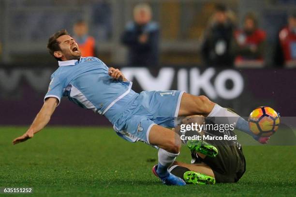 Senad Lulic of SS Lazio competes for the ball with Mati Fernandez of AC Milan during the Serie A match between SS Lazio and AC Milan at Stadio...