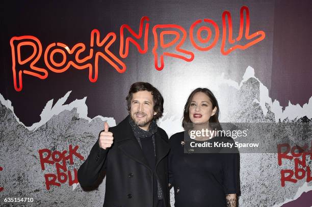 Guillaume Canet and Marion Cotillard attend the "Rock'N Roll" Premiere at Cinema Pathe Beaugrenelle on February 13, 2017 in Paris, France.