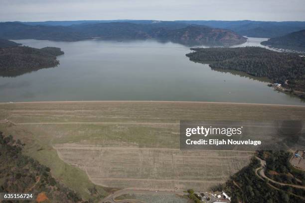 Oroville Lake and its spillways are seen from the air on February 13, 2017 in Oroville, California. Almost 200,000 people were ordered to evacuate...