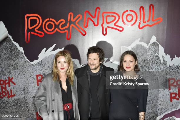 Camille Rowe, Marion Cotillard and Guillaume Canet attend the "Rock'N Roll" Premiere at Cinema Pathe Beaugrenelle on February 13, 2017 in Paris,...