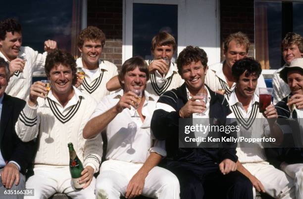 The New Zealand team celebrate their first Test win over England in England with a glass of champagne at the end of the 2nd Test match between...