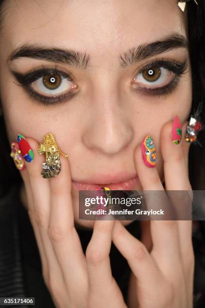 Model prepares at the CND For Libertine Fall/Winter 2017 during, New York Fashion Week:The Shows at Skylight at Clarkson Sq on February 13, 2017 in...
