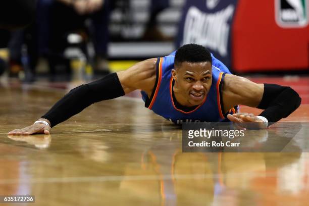 Russell Westbrook of the Oklahoma City Thunder hits the floor going after a loose ball in the first half against the Washington Wizards at Verizon...