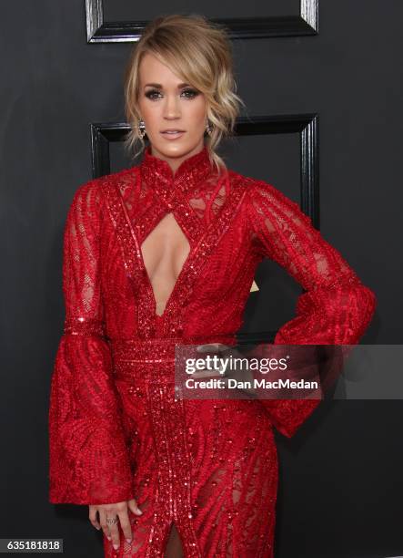Singer Carrie Underwood arrives at The 59th GRAMMY Awards at Staples Center on February 12, 2017 in Los Angeles, California.
