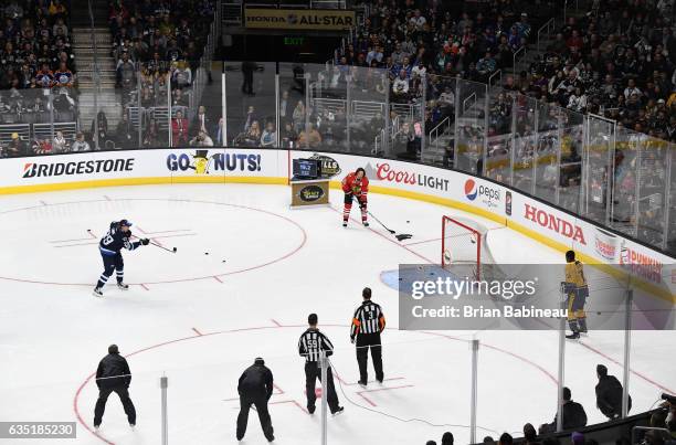 Patrik Laine of the Winnipeg Jets takes his turn in the Draft Kings Accuracy Shooting competition as part of the 2017 Coors Light NHL All-Star Skills...