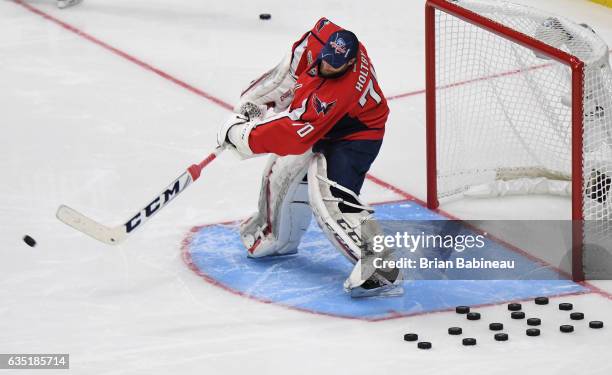 Braden Holtby of the Washington Capitals shoots the puck during the Gatorade Skills Challenge Relay as part of the 2017 Coors Light NHL All-Star...