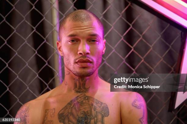 Model Jeremy Meeks prepares backstage for the Philipp Plein collection during, New York Fashion Week: The Shows at New York Public Library on...