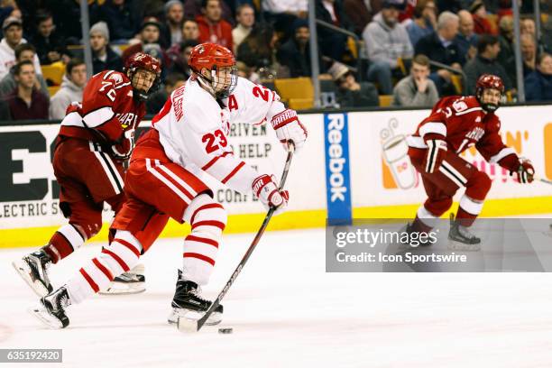 Boston University Terriers forward Jakob Forsbacka Karlsson clears the puck from Terrier ice during the second period of the Beanpot Tournament...
