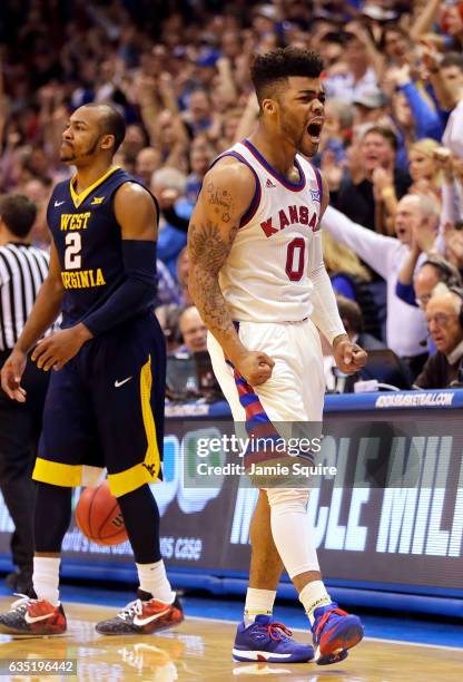 Frank Mason III of the Kansas Jayhawks reacts after Jevon Carter of the West Virginia Mountaineers loses the ball out-of-bounds during the game at...